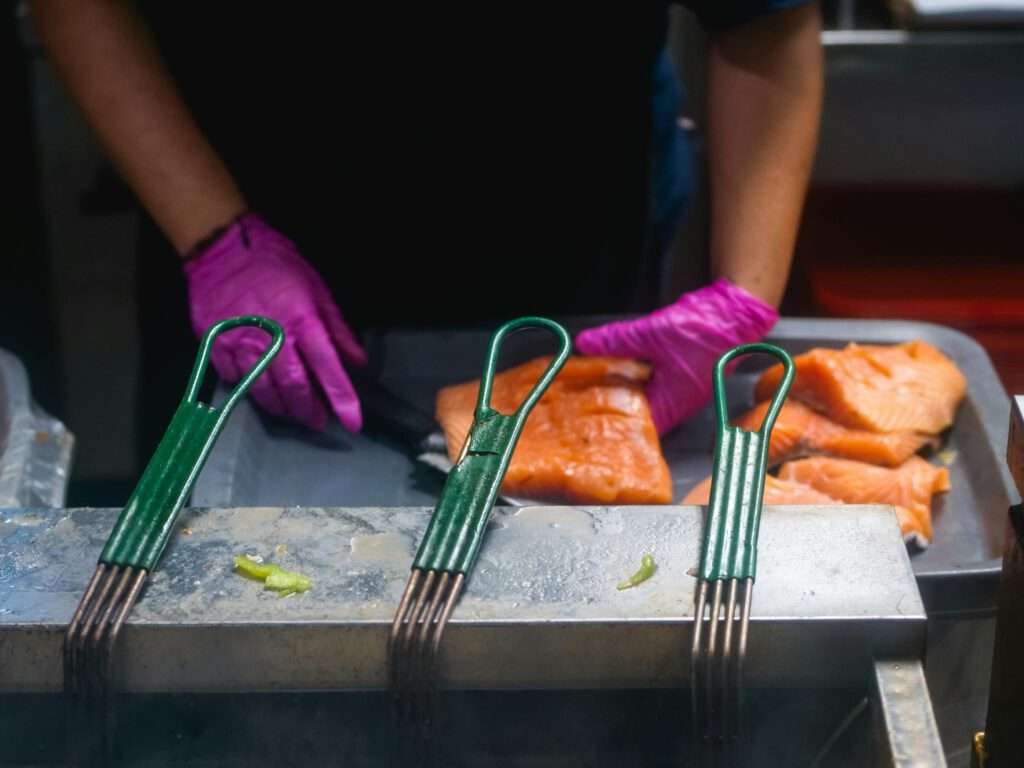 Free stock photo of adult, baking, catch of fish